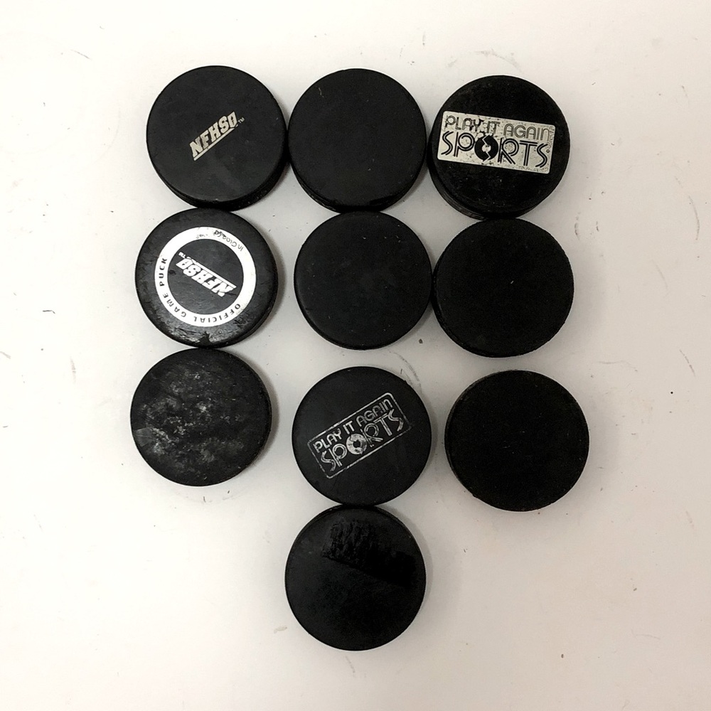 10 Used hockey pucks lot